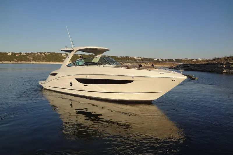 Rancho Del Lago Yacht Photos Pics 2017 Sea Ray Sundancer 350 yacht cruising on calm waters under clear skies.