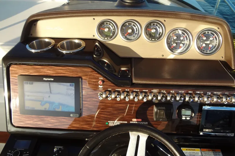 Rancho Del Lago Yacht Photos Pics 2017 Sea Ray Sundancer 350 dashboard with navigation system and gauges.