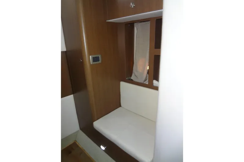 Rancho Del Lago Yacht Photos Pics Interior seating area of 2017 Sea Ray Sundancer 350 yacht with wooden paneling.