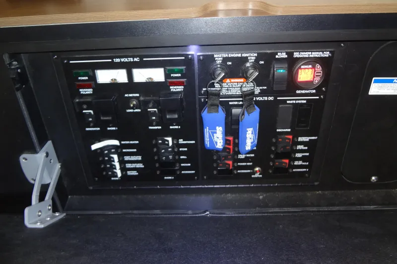 Rancho Del Lago Yacht Photos Pics Electrical control panel of 2017 Sea Ray Sundancer 350 boat, featuring various switches and meters.