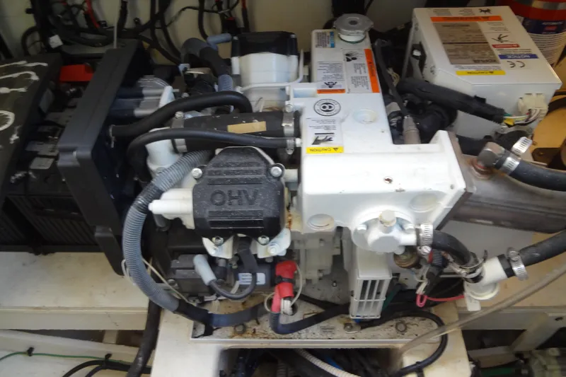 Rancho Del Lago Yacht Photos Pics Engine compartment of a 2017 Sea Ray Sundancer 350 boat, showcasing mechanical components.