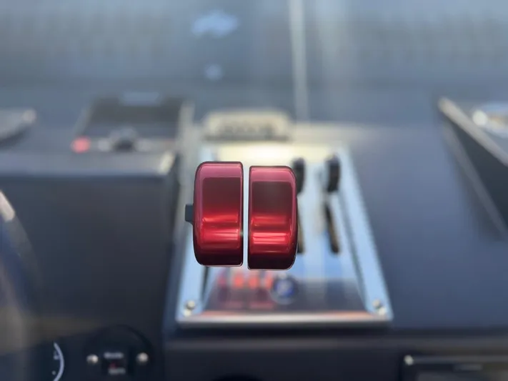  Yacht Photos Pics Close-up of 2024 Goldfish 46 Open boat throttle controls.