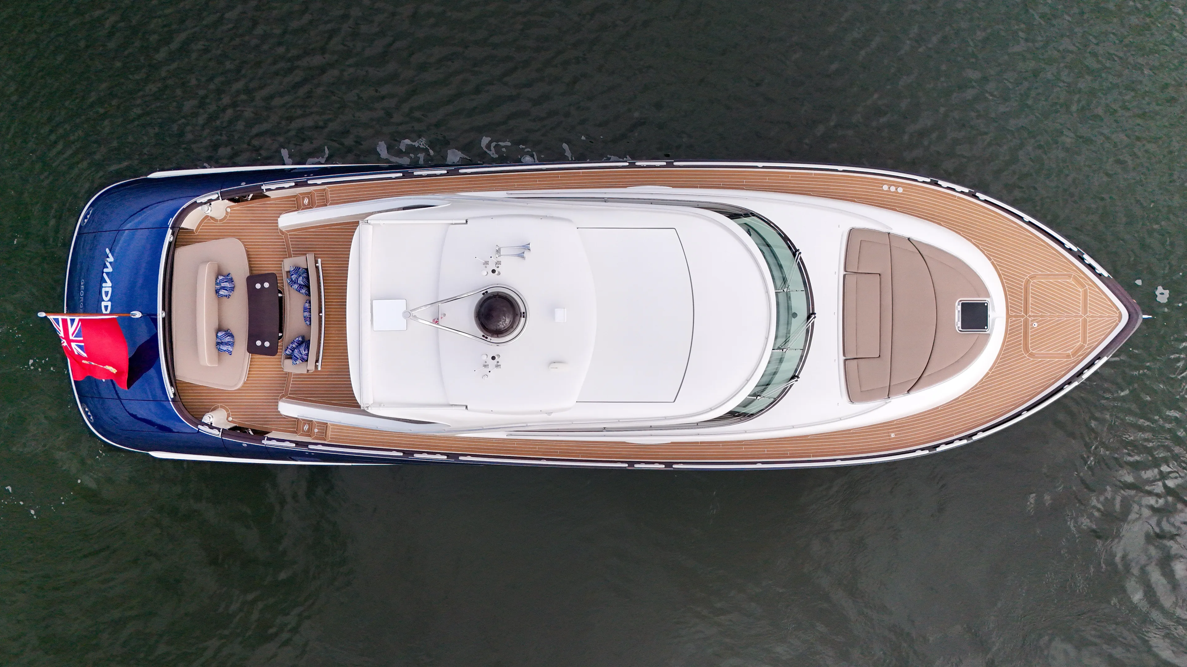Maddamc2 Yacht Photos Pics Aerial view of 2023 Zeelander 72 luxury yacht on water.