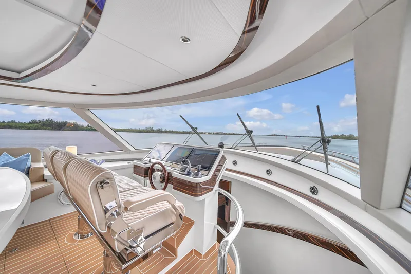 Maddamc2 Yacht Photos Pics Luxurious helm station of the 2023 Zeelander 72 yacht with panoramic views.
