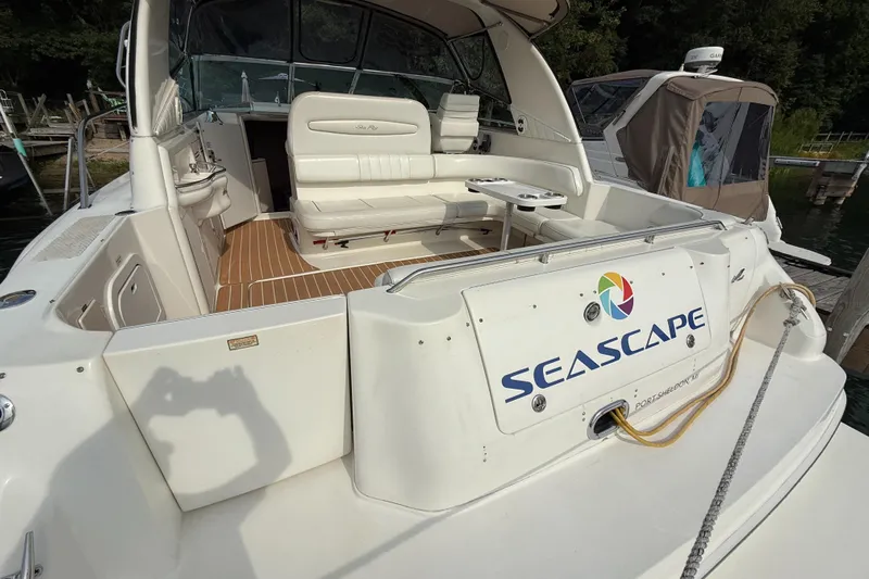 Seascape Yacht Photos Pics 1998 Sea Ray 400 Sundancer yacht with "Seascape" branding, docked at a marina.