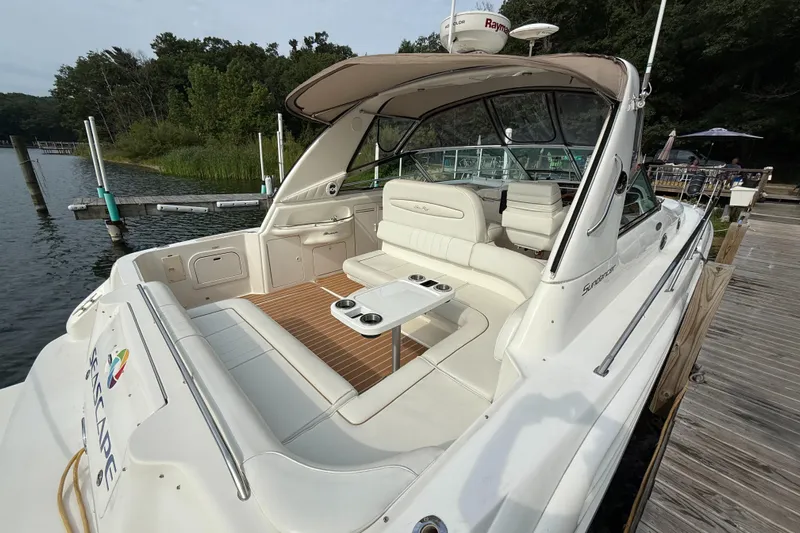 Seascape Yacht Photos Pics 1998 Sea Ray 400 Sundancer yacht docked, featuring spacious seating and elegant design.