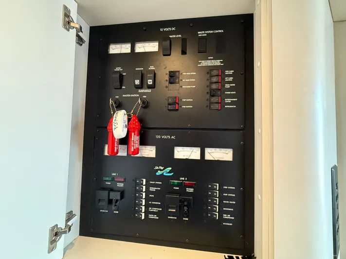Seascape Yacht Photos Pics Electrical control panel on a 1998 Sea Ray 400 Sundancer yacht.
