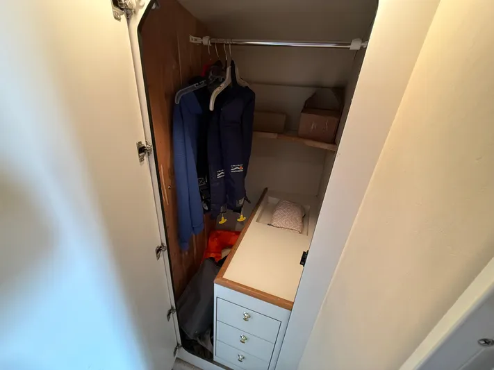 Seascape Yacht Photos Pics Closet interior on 1998 Sea Ray 400 Sundancer yacht with hanging clothes and storage.
