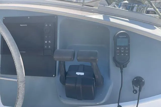 Three Seas Yacht Photos Pics Control panel of 2002 Fountaine Pajot Belize 43 catamaran with navigation equipment.