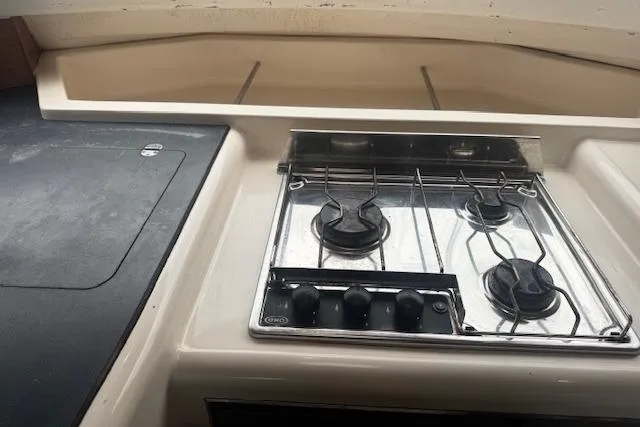 Three Seas Yacht Photos Pics Stove in 2002 Fountaine Pajot Belize 43 yacht kitchen area.