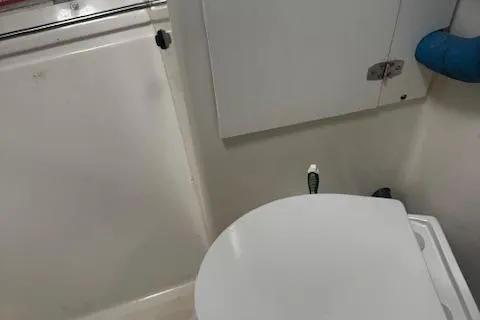 Three Seas Yacht Photos Pics Bathroom interior of 2002 Fountaine Pajot Belize 43 catamaran.