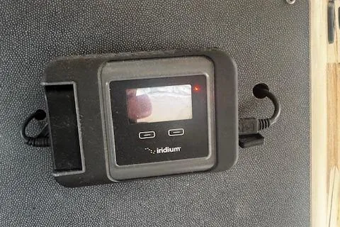 Three Seas Yacht Photos Pics Iridium satellite device on 2002 Fountaine Pajot Belize 43 yacht interior wall.