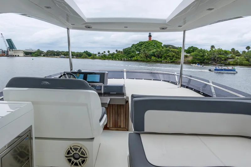 Sunshine Yacht Photos Pics 2020 Galeon 550 Fly yacht interior with scenic waterway view.