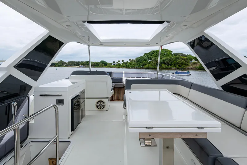 Sunshine Yacht Photos Pics Luxurious 2020 Galeon 550 Fly yacht interior with sleek seating and modern amenities.
