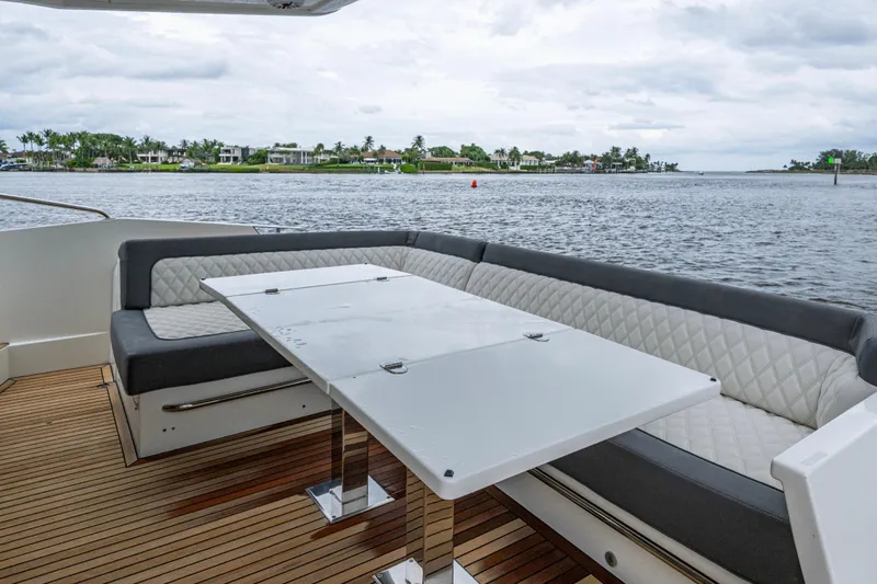Sunshine Yacht Photos Pics Luxury seating area on 2020 Galeon 550 Fly yacht with waterfront view.