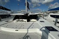 Leopard 50 catamaran, 2020 model, docked at marina under blue sky.