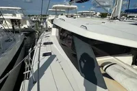 2020 Leopard 50 yacht docked under a clear blue sky.