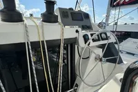 2020 Leopard 50 yacht helm with steering wheel and navigation controls.