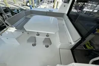 Spacious seating area on a 2020 Leopard 50 catamaran, featuring a modern white table.