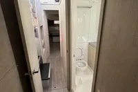 2020 Leopard 50 yacht interior with modern bathroom and hallway view.