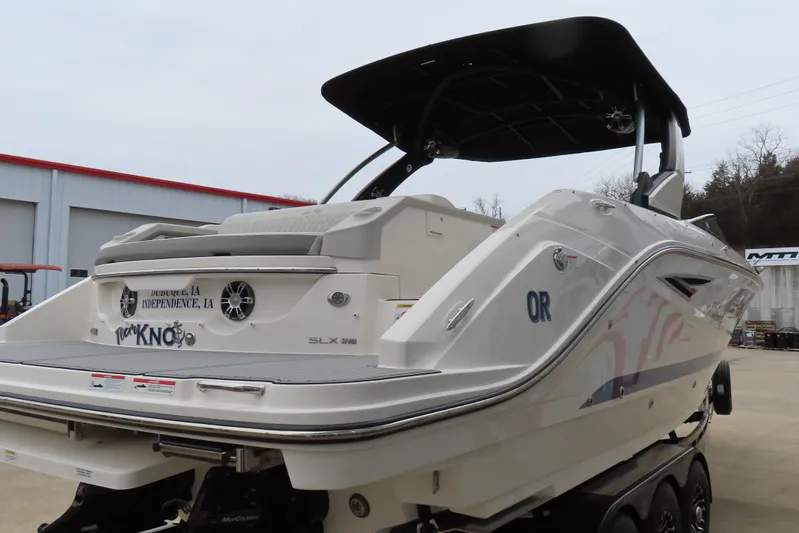  Yacht Photos Pics 2021 Sea Ray 310 SLX boat on trailer, rear view, outdoor setting.
