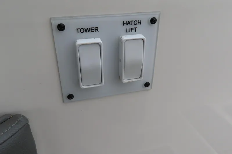  Yacht Photos Pics Switch panel on 2021 Sea Ray 310 SLX boat for tower and hatch lift.