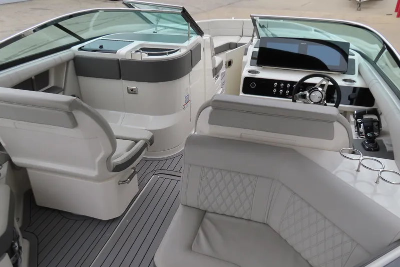  Yacht Photos Pics 2021 Sea Ray 310 SLX boat interior with modern helm, seating, and sleek design.
