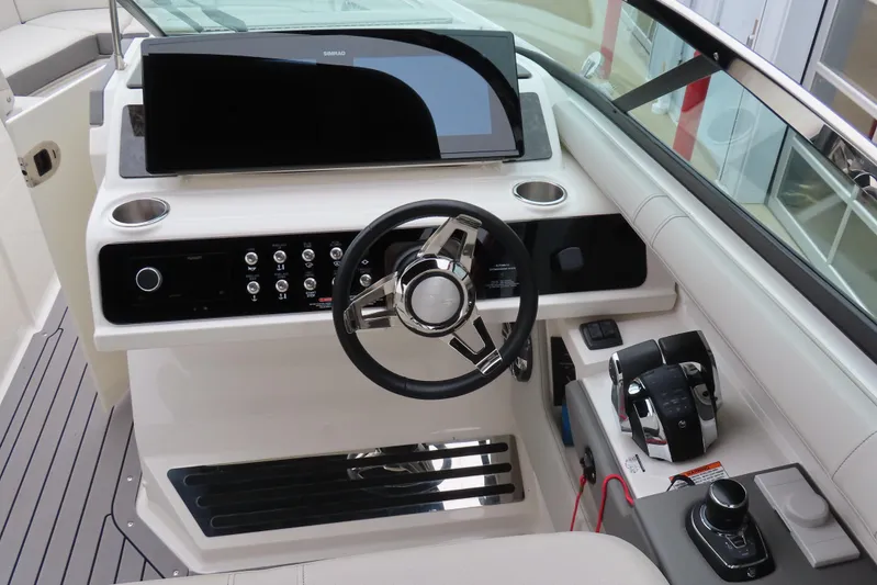  Yacht Photos Pics 2021 Sea Ray 310 SLX boat helm with modern controls and steering wheel.