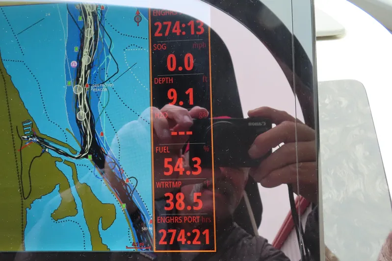  Yacht Photos Pics Navigation display on 2021 Sea Ray 310 SLX showing map and engine data.