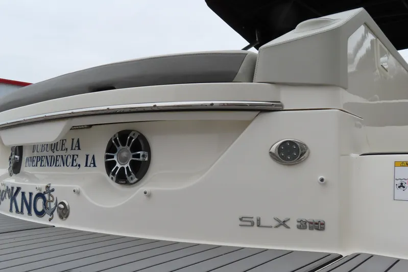  Yacht Photos Pics 2021 Sea Ray 310 SLX boat rear view with speakers and model branding.