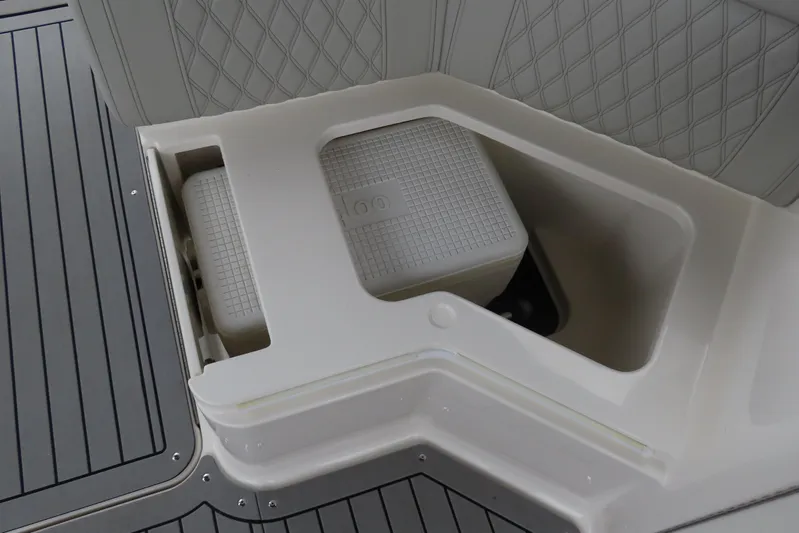  Yacht Photos Pics 2021 Sea Ray 310 SLX boat storage compartment with cooler, featuring sleek design and functionality.