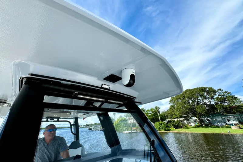 No Joke Yacht Photos Pics 2022 Robalo R360 Center Console boat on water, featuring sleek design and modern technology.