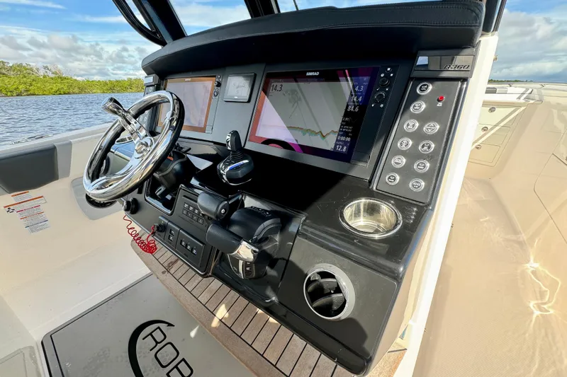 No Joke Yacht Photos Pics 2022 Robalo R360 Center Console dashboard with advanced navigation and control systems.
