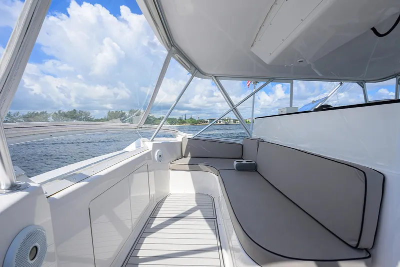 Alli-gator Yacht Photos Pics Viking 50 Convertible 2000 yacht interior with sleek seating and ocean view.