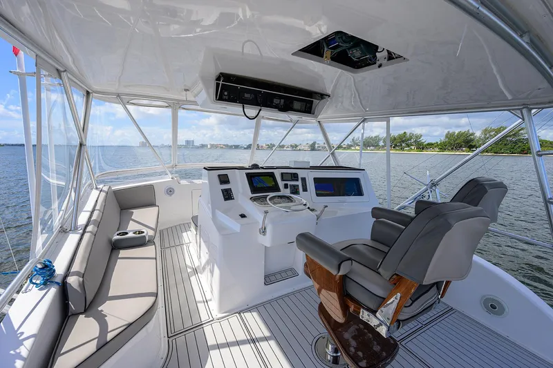 Alli-gator Yacht Photos Pics Helm of 2000 Viking 50 Convertible yacht with modern controls and seating.