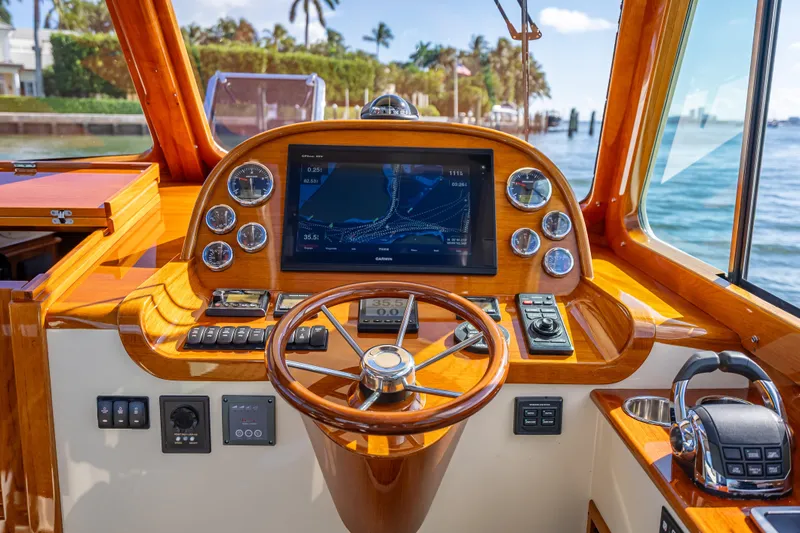 Gracious Yacht Photos Pics Hinckley Picnic Boat 37 MKIII 2018 helm with navigation display and controls.