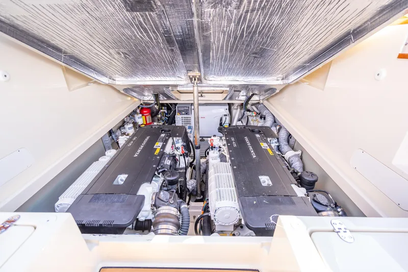 Gracious Yacht Photos Pics Engine compartment of 2018 Hinckley Picnic Boat 37 MKIII with dual Volvo Penta engines.
