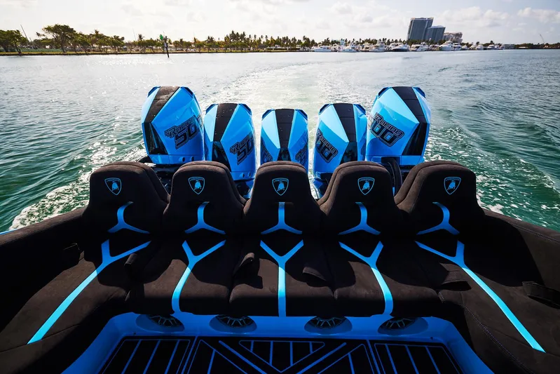  Yacht Photos Pics 2024 Midnight Express 43' Solstice boat with six powerful engines on open water.