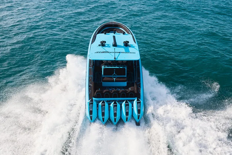  Yacht Photos Pics 2024 Midnight Express 43' Solstice speedboat cruising on open water.