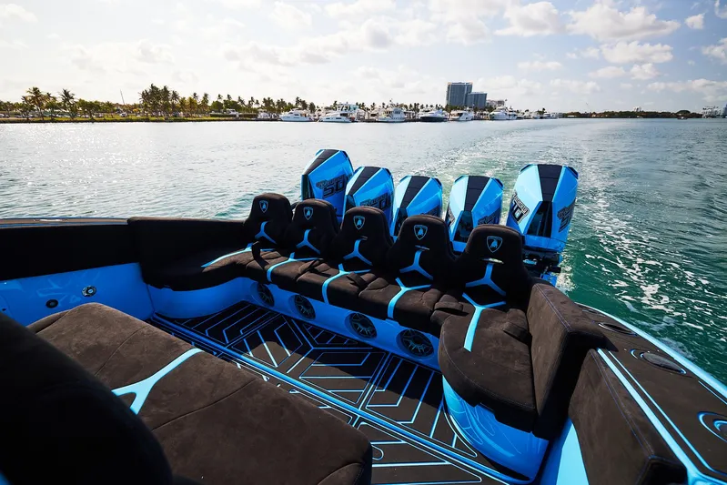  Yacht Photos Pics 2024 Midnight Express 43' Solstice luxury boat with sleek blue and black seating.