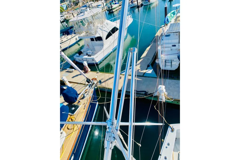  Yacht Photos Pics Aerial view of boats docked at a marina, featuring a 2001 Hatteras 60 Convertible.