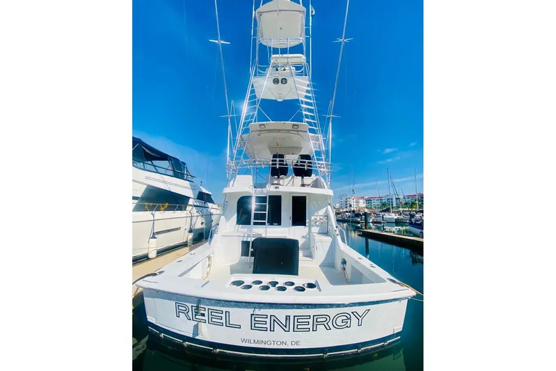  Yacht Photos Pics 2001 Hatteras 60 Convertible yacht docked, named "Reel Energy," in Wilmington, DE marina.