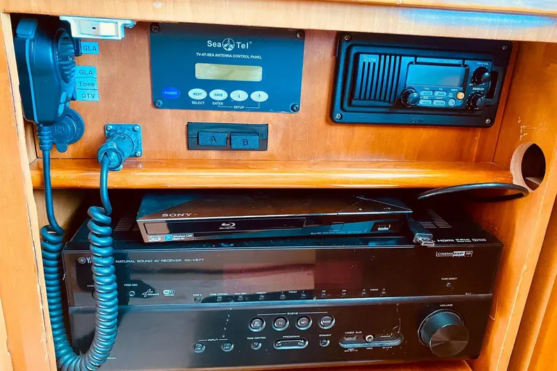  Yacht Photos Pics Electronics panel on 2001 Hatteras 60 Convertible yacht with communication and audio equipment.