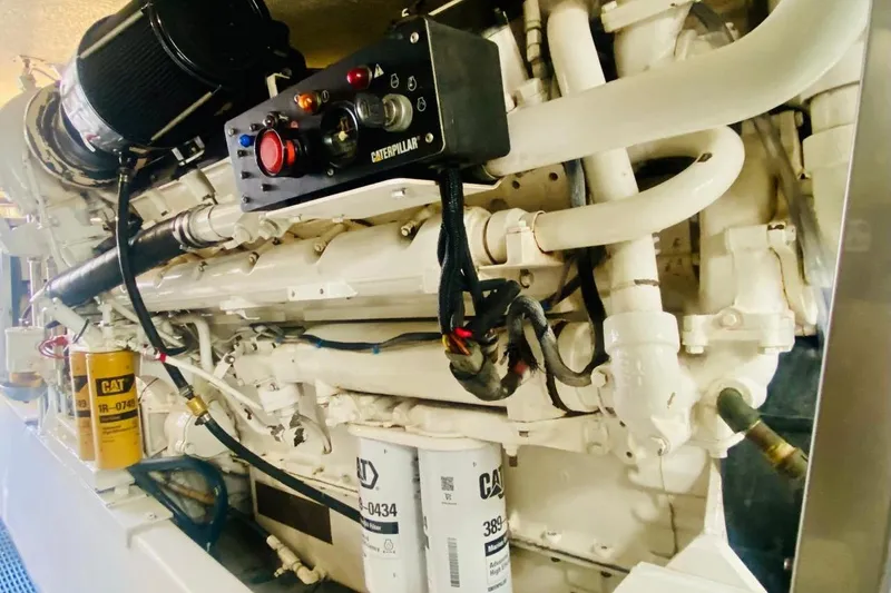  Yacht Photos Pics Engine room of 2001 Hatteras 60 Convertible with Caterpillar components.