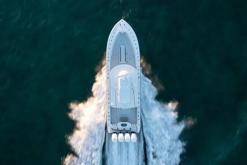  Yacht Photos Pics Aerial view of 2019 Yellowfin 39 Offshore boat cruising on open water.