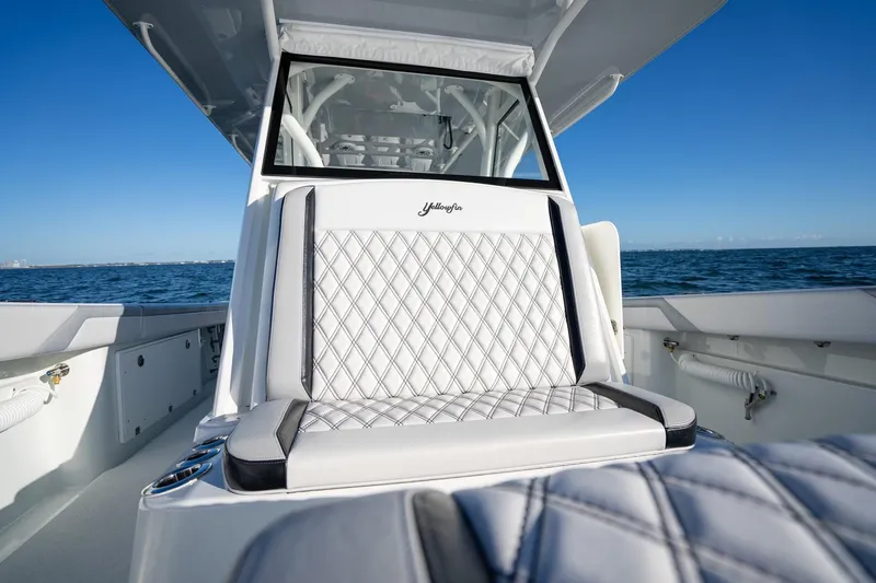  Yacht Photos Pics 2019 Yellowfin 39 Offshore boat with luxurious seating, cruising on open water.