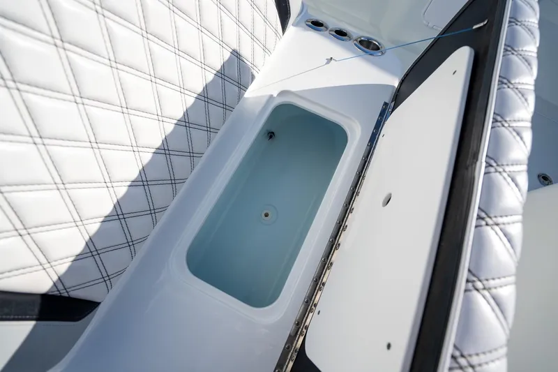  Yacht Photos Pics 2019 Yellowfin 39 Offshore boat interior with open storage compartment.