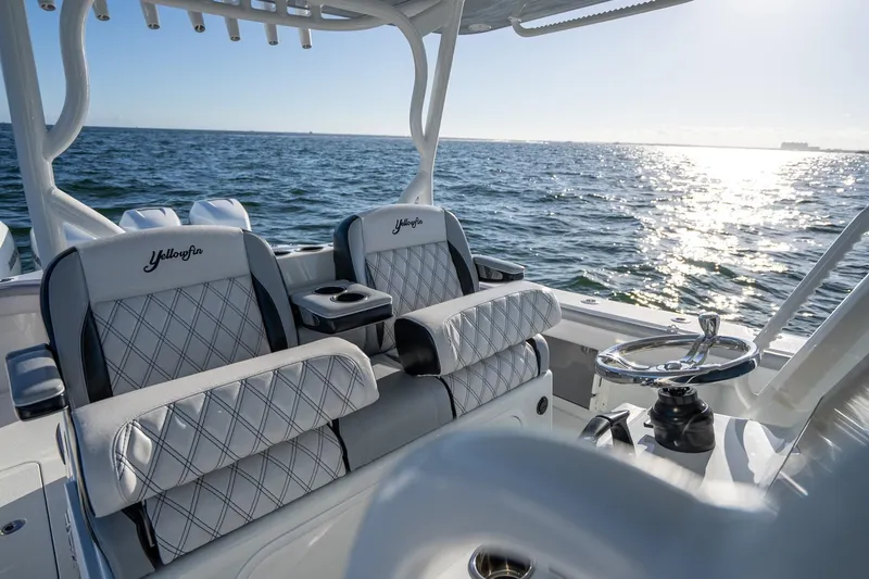  Yacht Photos Pics 2019 Yellowfin 39 Offshore boat interior with luxurious seating and ocean view.