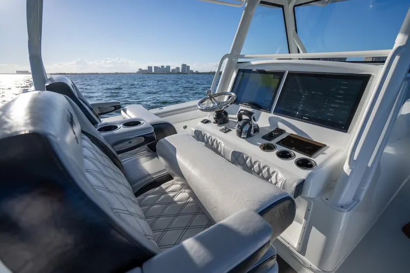  Yacht Photos Pics 2019 Yellowfin 39 Offshore boat interior with modern dashboard and ocean view.