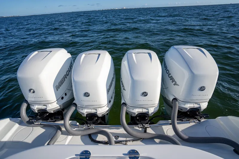 Yacht Photos Pics 2019 Yellowfin 39 Offshore boat with four Mercury outboard engines on open water.